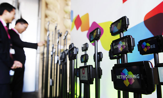 Week in business: Phones are displayed at the Mobile World congress in Barcelona, Spain