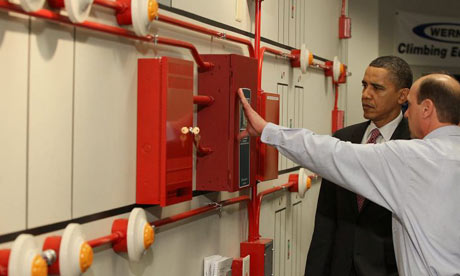 Barack Obama tours a fire alarm display in Maryland