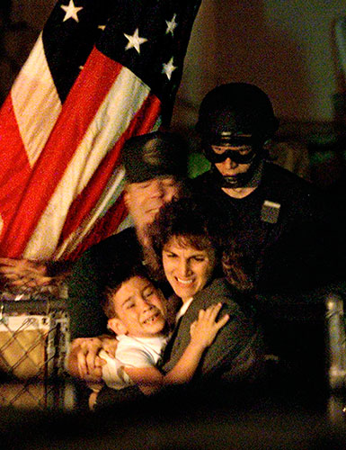 Elian Timeline: U.S. federal agents remove Elian from his great-uncle's house in Miami