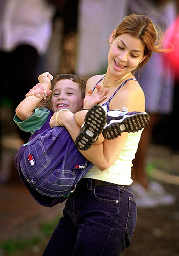 Elian Timeline: Elian Gonzalez plays with his cousin Marisleysis in Little Havana