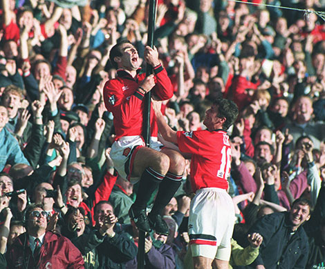 Old Trafford History: Cantona celebrates scoring a penalty on his return after his ban