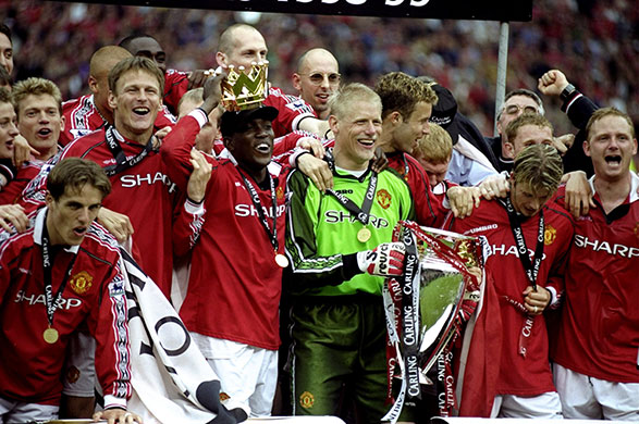 Old Trafford History: Manchester Utd players celebrate winning the 1999 title