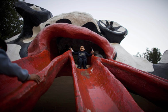 24 hours in pictures: Jerusalem: An Israeli boy plays at 