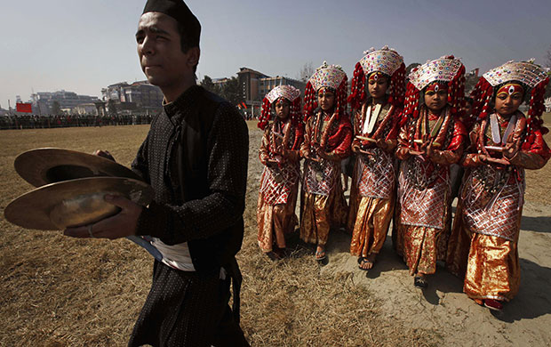 24 Hours in Pictures: Five Nepalese girls dressed as goddesses in National Democracy day