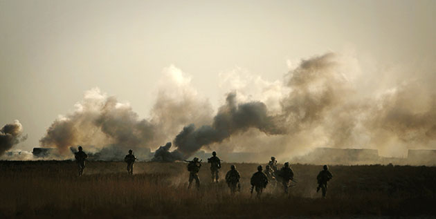 24 Hours in Pictures: US Marines retreat after battling Taliban fire