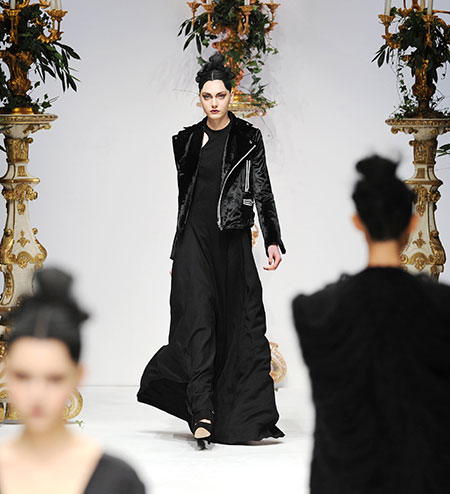 London Fashion Week: A model presents an outfit from Italian designer Kinder Aggugini