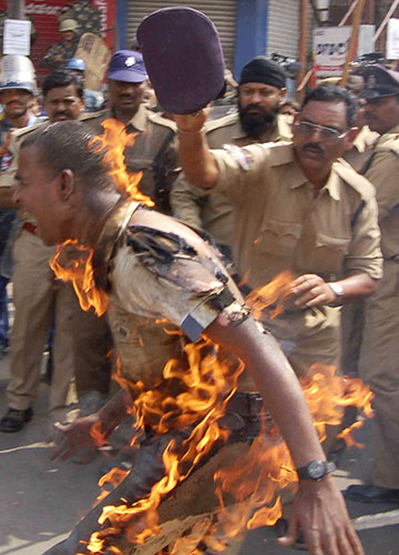 24 hours in pictures: A Pro-Telangana sets himself on fire in Hyderabad, India