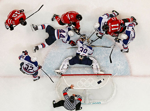 Olympics: Goaltender Miller of the U.S. makes a save