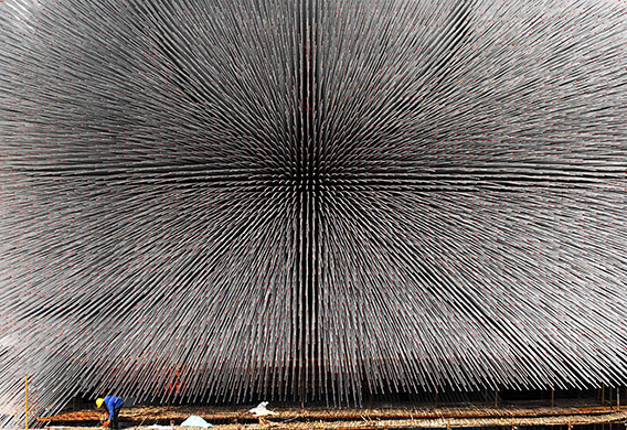 24 hours in pictures: Shanghai, China: A worker at the construction of the Seed Cathedral
