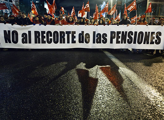 24 hours in pictures: Madrid, Spain: Demonstrators hold a banner
