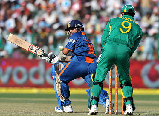 Tendulkar record innings: Tendulkar of India sweeps a delivery past Boucher and towards the boundary