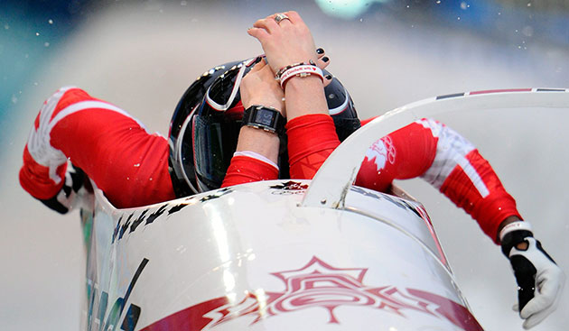 winter olympics day 12: Canada's Helen Upperton & Shelley-Ann Brown take their positions in the bob