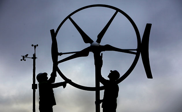 Wind Energy: Members of staff at Renewable Devices Swift Turbine, work on a turbine unit