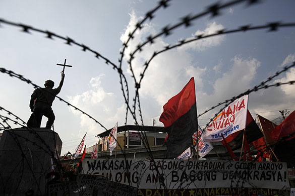 24 hours in pictures: Manila, Philippines: Protesters during an anti-government rally