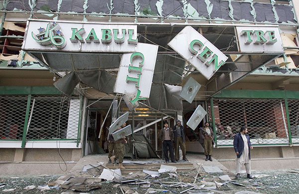 Kabul explosions: Military personnel stand in front of Kabul City Centre shopping mall