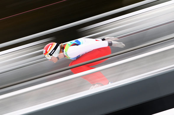 Winter Olympics Day 14: Austria's Felix Gottwald practices ahead of the Large Hill Ski Jump 