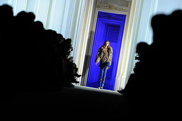 24 hours: Milan, Italy: A model displays an outfit from Just Cavalli's collection