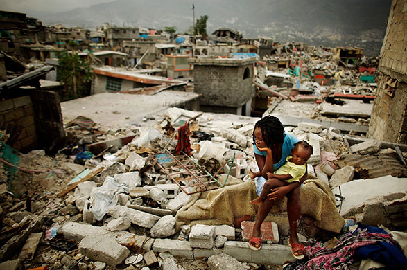 24 Hours in Pictures: Haitians Continue To Struggle One Month After Earthquake