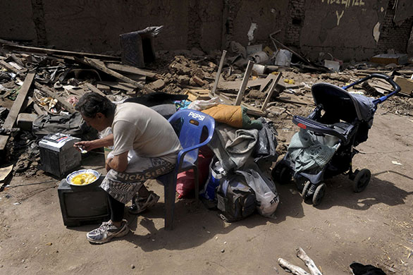 Chile Earthquake: Man next to his belongings after a major earthquake in Santiago, Chile