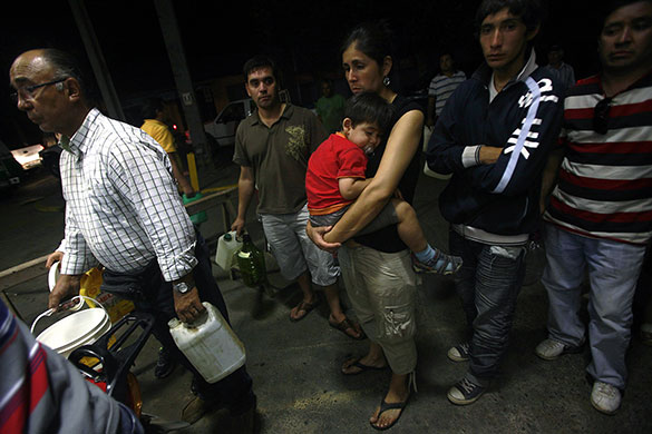 Chile Earthquake: Chileans line up for gasoline after a major earthquake in Pelluhue, Chile