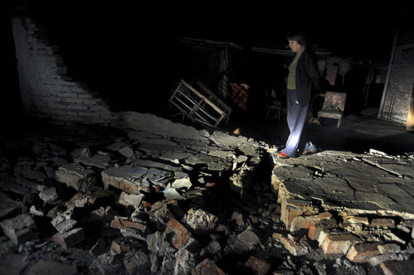 Chile Earthquake: A resident living in the streets following earthquake in Santiago, Chile