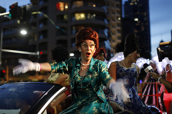 24 hours in pictures: A parade goer at Gay and Lesbian Mardi Gras parade Sydney. Australia