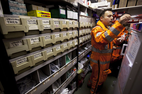 London's Air Ambulance: Doctor Misha Heron prepares medical kits and treatment drugs