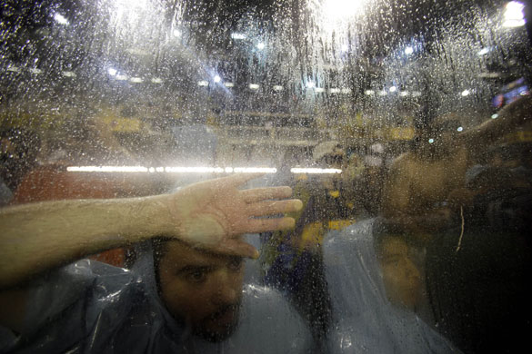 Eyewitness: Buenos Aires, Argentina: Fans wait for a soccer match to start