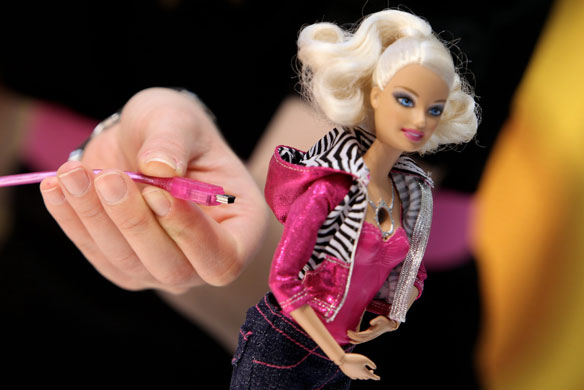 Nuremberg toy fair: A USB cable is inserted into the back of the Barbie video doll 