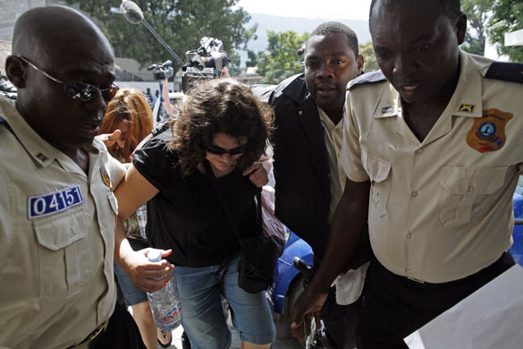 Haiti child trafficking: Charisa Coulter on her way into court in Port-au-Prince