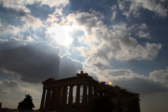 24 Hours in Pictures: Greek surveyors work on the ancient Parthenon templein Athens