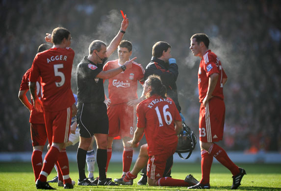 Merseyside Derby: Referee Martin Atkinson shows a red card to Sotiros Kyrgiakos of Liverpool