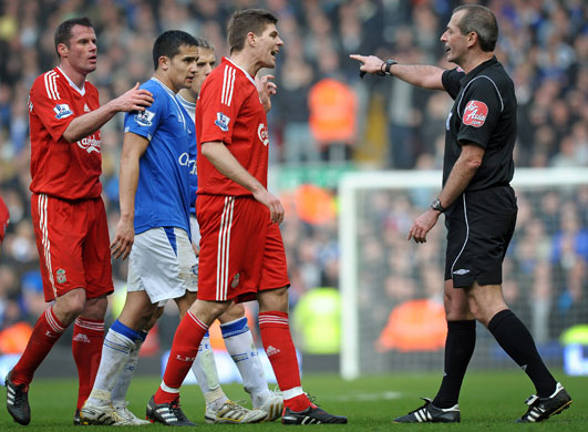 Merseyside Derby: Liverpool captain Steven Gerrard speaks with referee Martin Atkinson