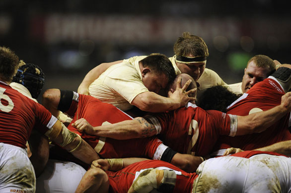 England Wales: Prop Davey Wilson grabs the Welsh hooker by the head