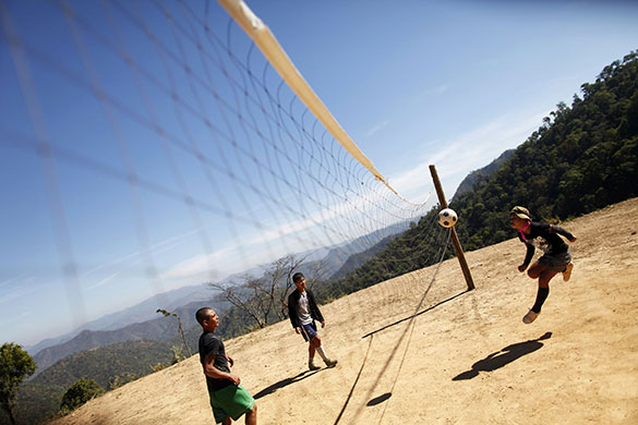 24 hours in pictures: Loi Tai Leng, Myanmar: Boys enjoy the game of takraw