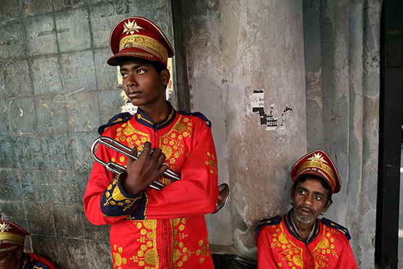 24 hours in pictures: Kolkata, India: Members of a band party