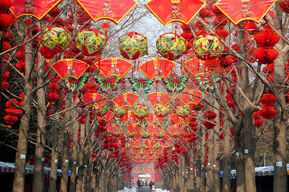 24 hours in pictures: Beijing, China: Red lanterns hang amid other festive decorations