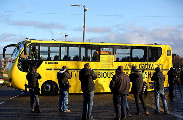 Amphibious bus: Media film and photograph an amphibious bus