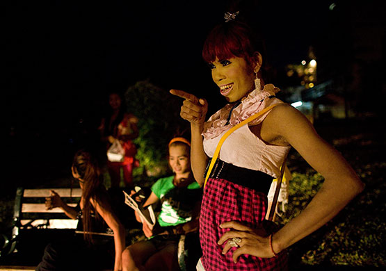 24 hours in pictures: Phnom Penh, Cambodia: Transexual prostitutes hang out on the streets