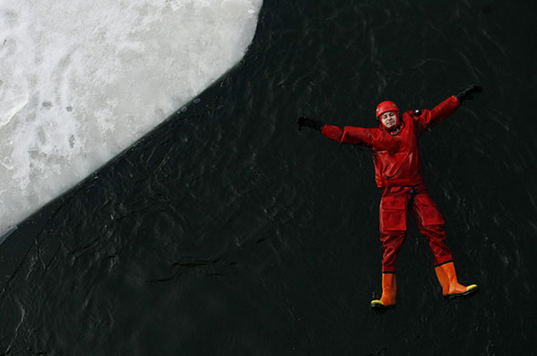 24 hours in pictures: Prague, Czech Republic: A fireman takes part in a  drill
