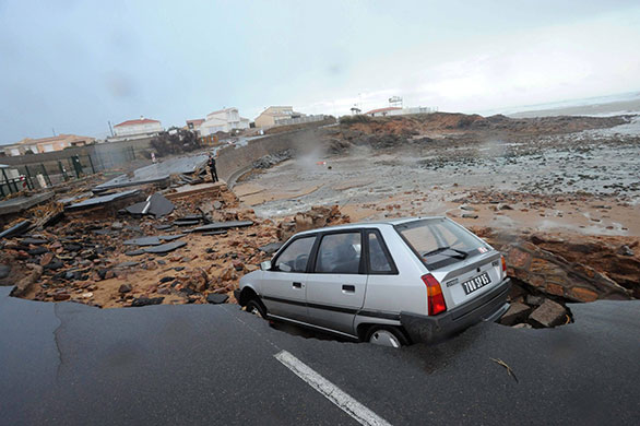 Storm damage in Europe: A coastal road is partially destroyed near L'Aguillon sur Mer, France