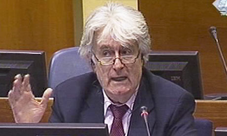 The former Bosnian Serb leader Radovan Karadzic takes the stand at  his war crimes trial at The Hague