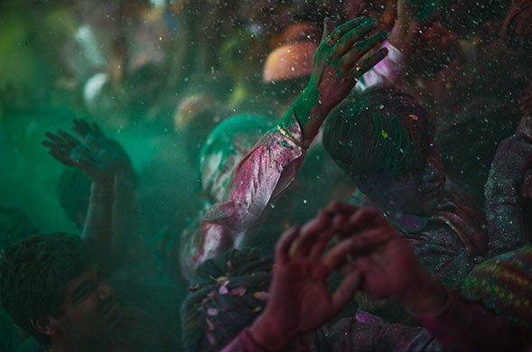 24 hours in pictures: Vrindavan, India: Hindu devotees play with colour during Holi celebrations