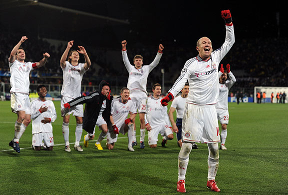 Tuesday: Arjen Robben and team-mates celebrate qualification to the quarter finals