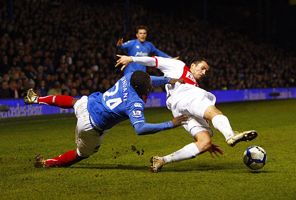 Tuesday: Portsmouth's Aruna Dindane and Birmingham City's Keith Fahey tussle  