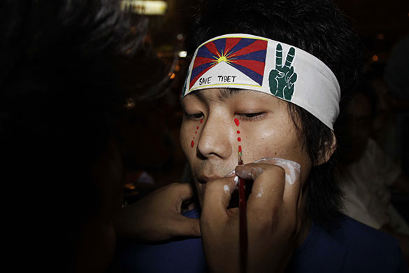 24 hours in pictures: Calcutta, India: Activist of Students for a Free Tibet