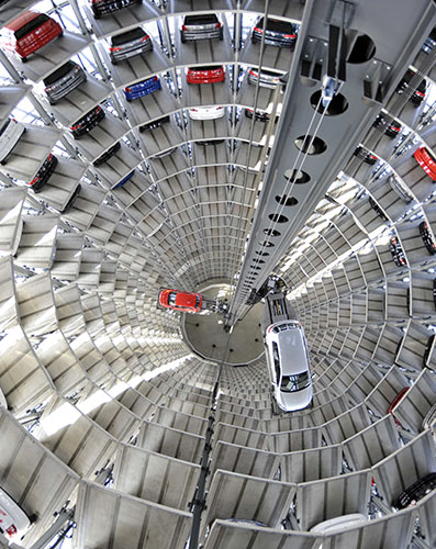 24 hours in pictures: Wolfsburg, Germany: Volkswagen Golf VI are stored at the 'CarTowers'