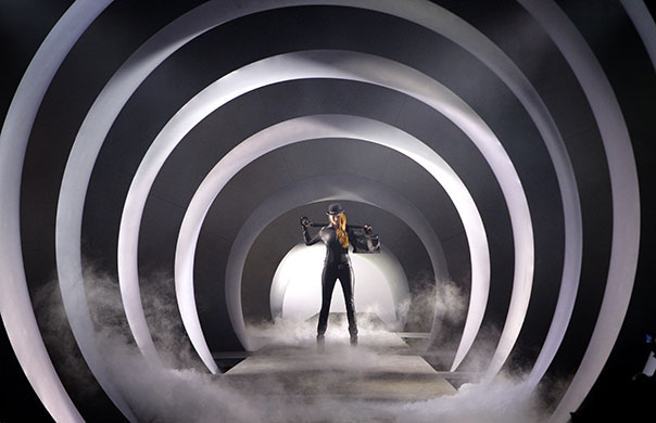 24 hours in pictures: Paris, France: A model during the Jean-Paul Gaultier for Hermes show