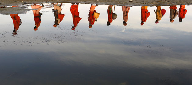 24 hours in pictures: Allahabad, India: Hindu holy men arrive on the banks of the Ganges
