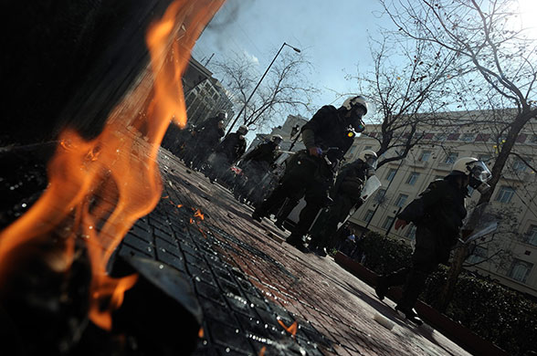 more strikes in greece: Protesters clash with riot police during a demonstration in central Athens